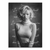 Black-and-white portrait of a glamour icon with short wavy hair in a turtleneck