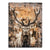 Majestic stag with large antlers set against a warm ochre and rust abstract background on canvas wall art.