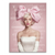Stylized Marilyn Monroe pop art canvas wall art with an oversized pink bow and white strapless dress on a soft pink background.
