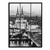 Cologne Cathedral with illuminated spires over the Rhine at dusk in black and white