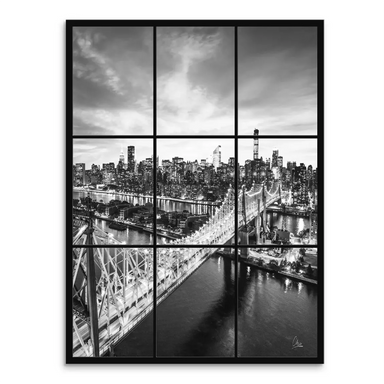 Seven-panel black-and-white canvas print featuring the Queensboro Bridge lit up over the New York City skyline at night.