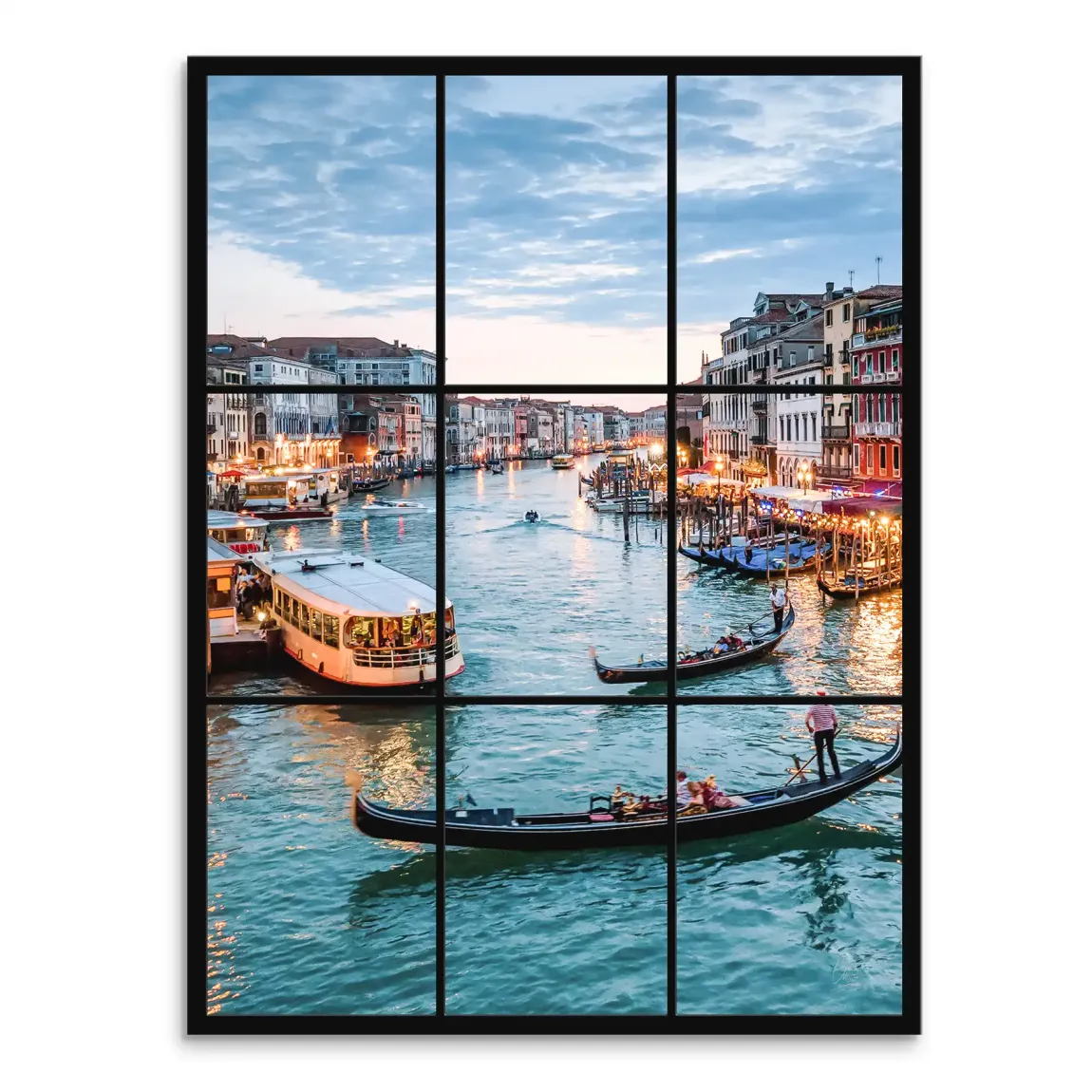 Twilight view of Venice Grand Canal through a black window-grid frame with gondolas and warm reflections on blue-green water.