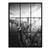 Left panel of a seven-panel monochrome canvas showing New York City skyscrapers and a distant bridge over a river