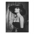 Sophia Loren portrait in black and white wearing a wide-brim hat and pearl necklace