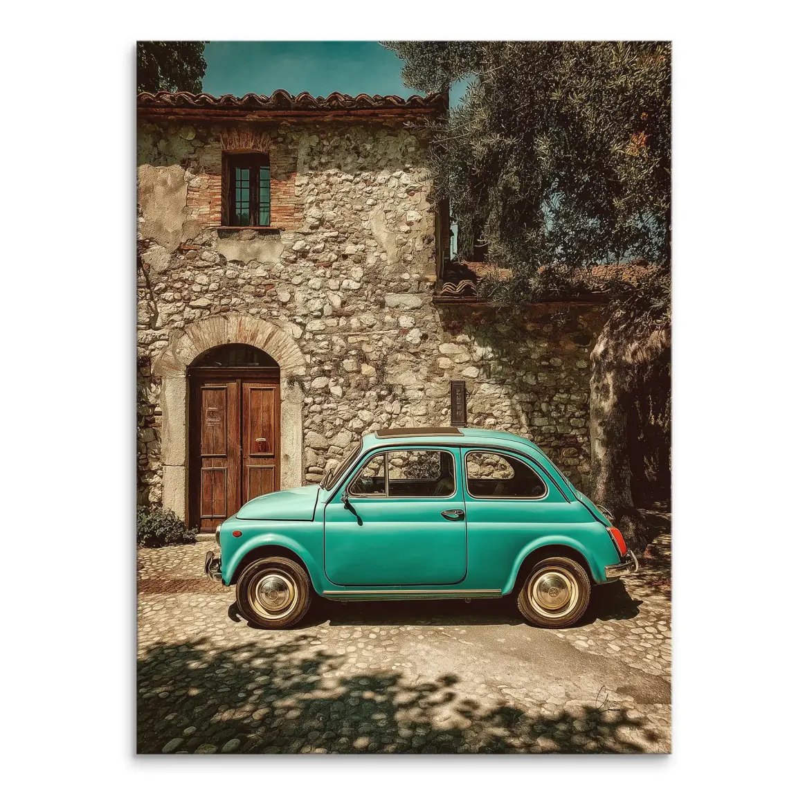 Vintage teal Fiat 500 parked on sunlit Tuscan cobblestones in front of a rustic stone building