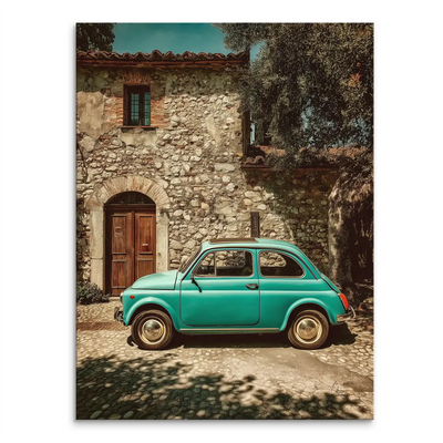 Vintage teal Fiat 500 parked on sunlit Tuscan cobblestones in front of a rustic stone building