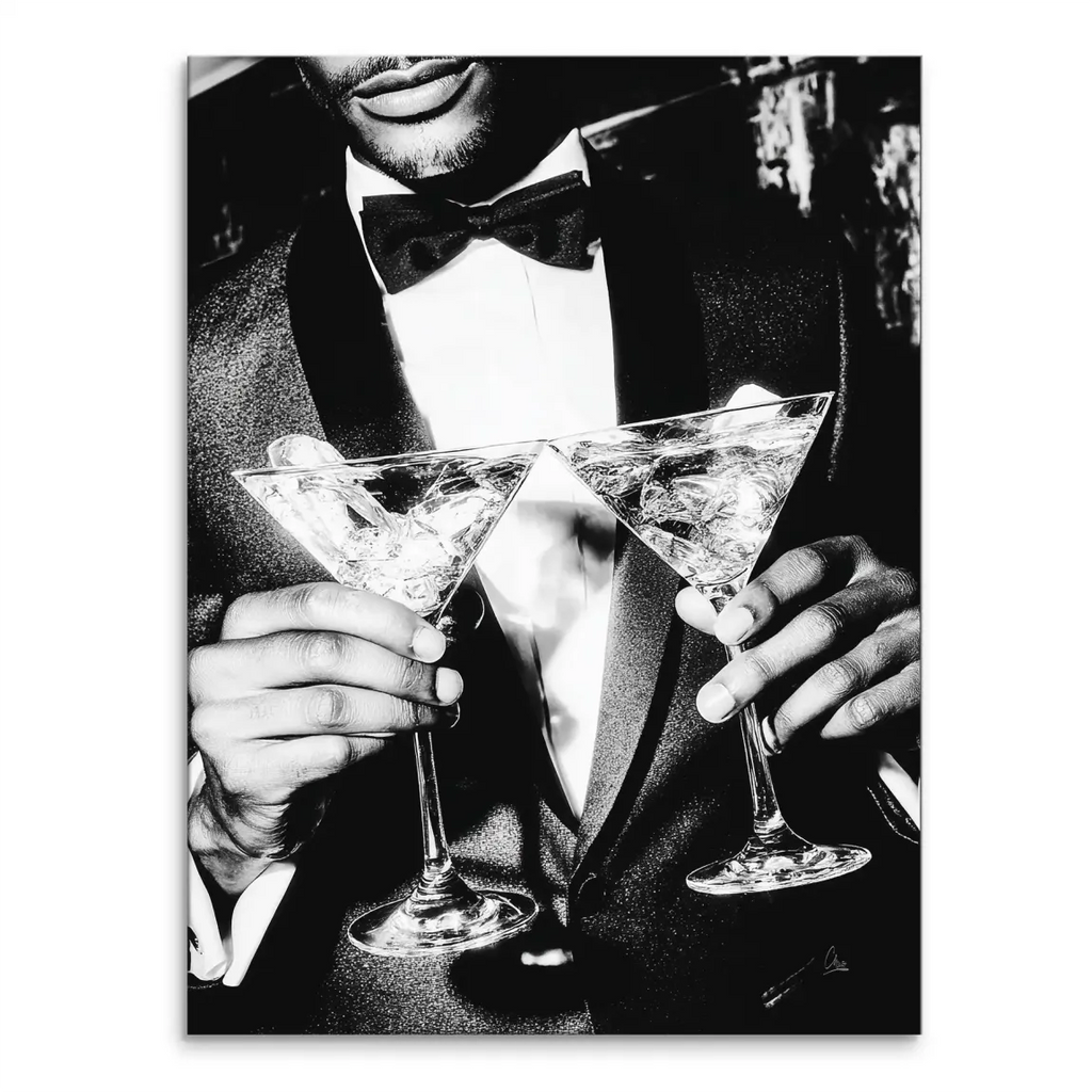 Black and white photograph of a man in a tuxedo raising two martini glasses in a toast on canvas wall art