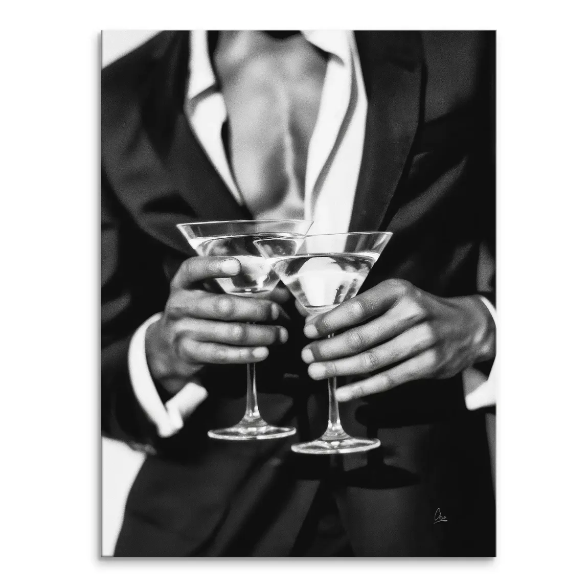 Close-up of a tuxedo-clad gentleman toasting with two martini glasses in grayscale