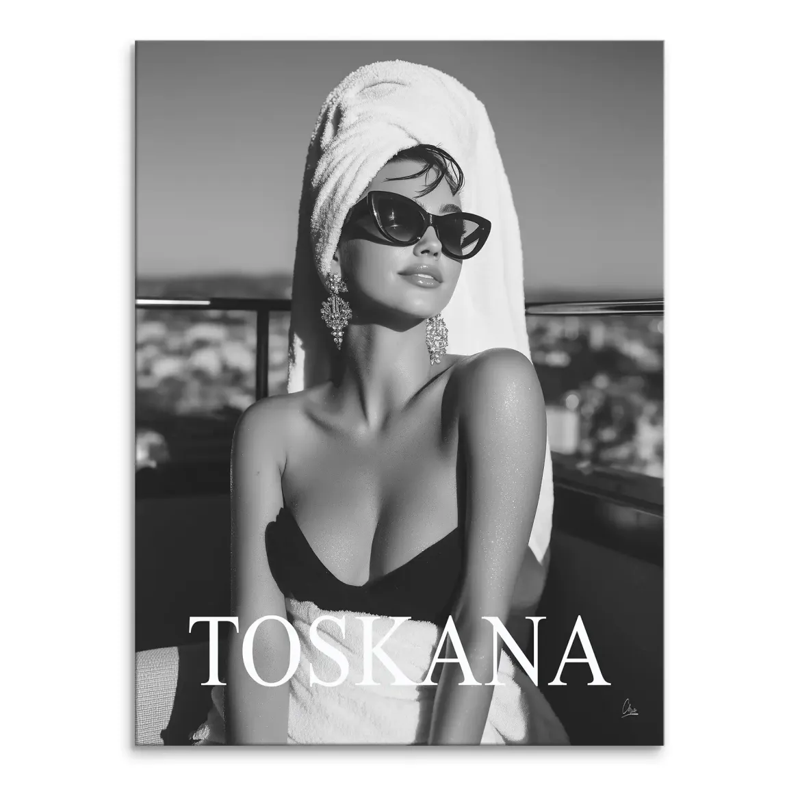Glamorous black-and-white fashion portrait of a woman on a sunlit balcony with a distant cityscape