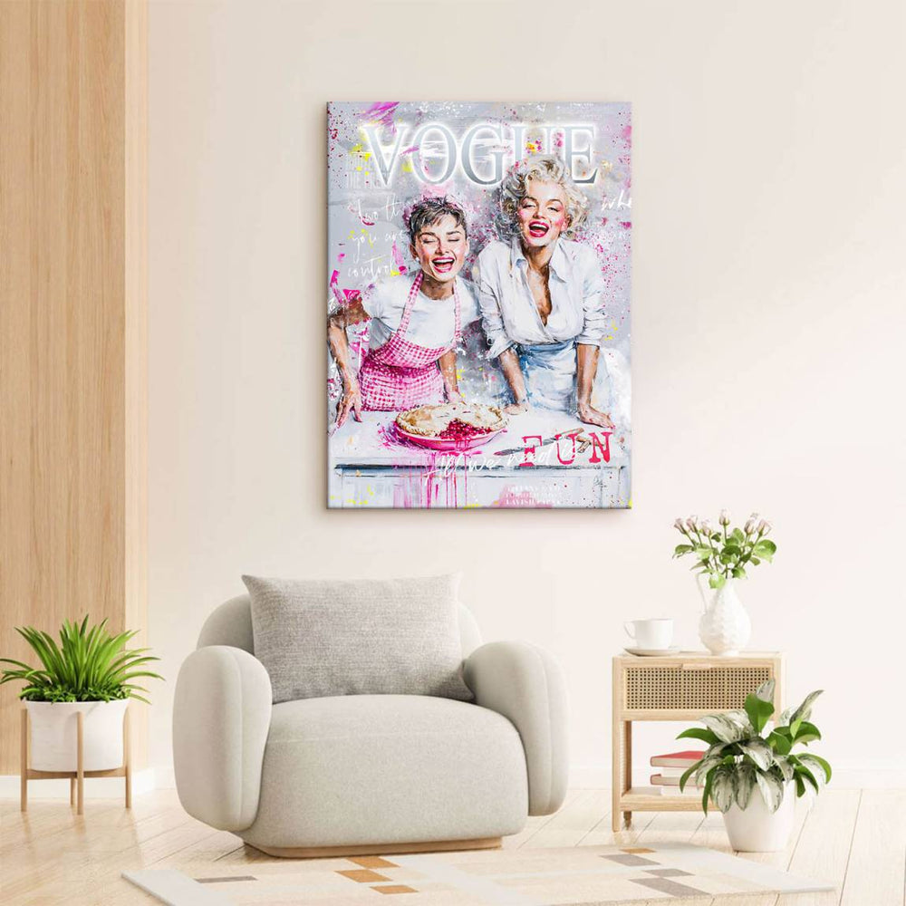 Vogue typography centerpiece surrounded by Pop Art elements on a pink, white, and gray palette.