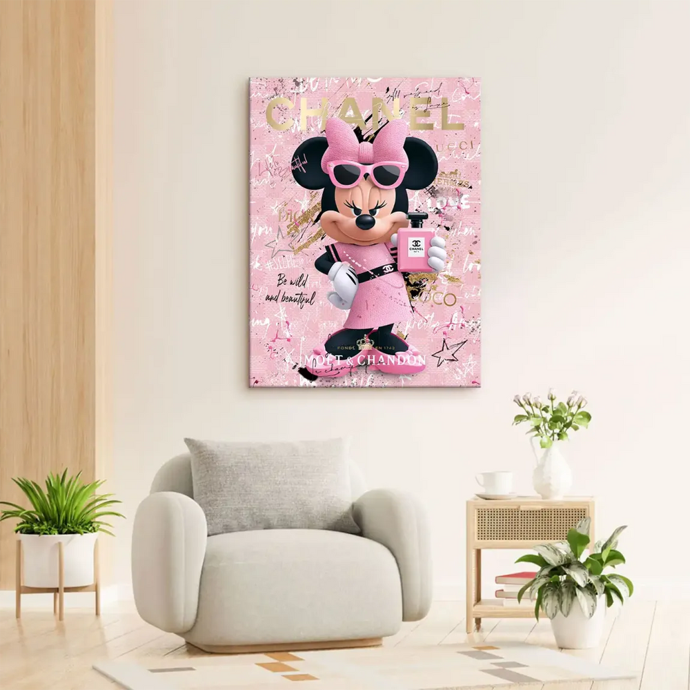 Pink rose background with paint splatters and luxury brand names on Minnie Mouse canvas art.