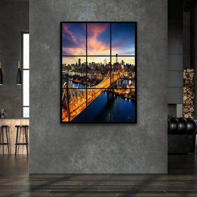 Aerial view of tall buildings along the river creating an urban skyline at twilight.