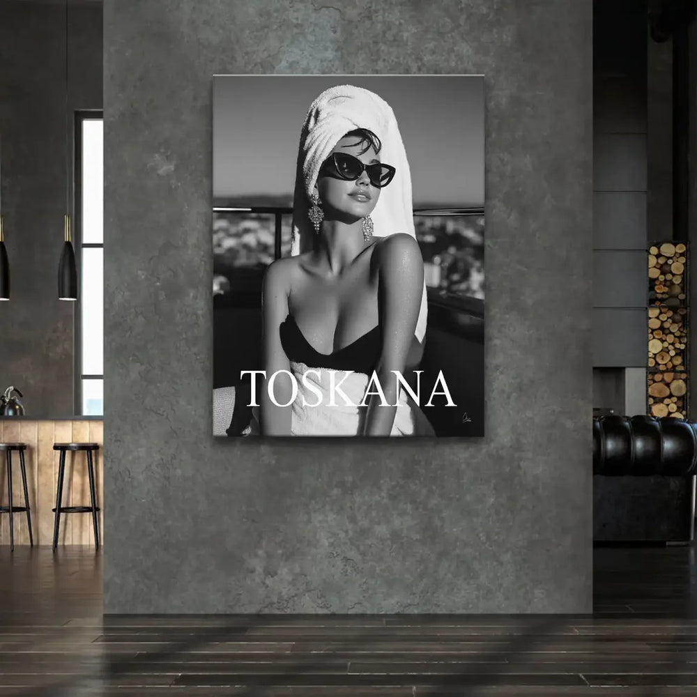 Monochrome fashion photography featuring a towel-wrapped hair styled subject on a balcony