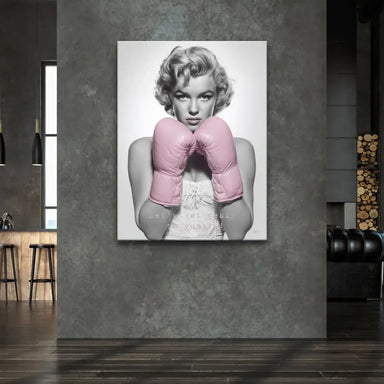 Marilyn Monroe boxing canvas wall art featuring vibrant pink gloves and retro vibe.