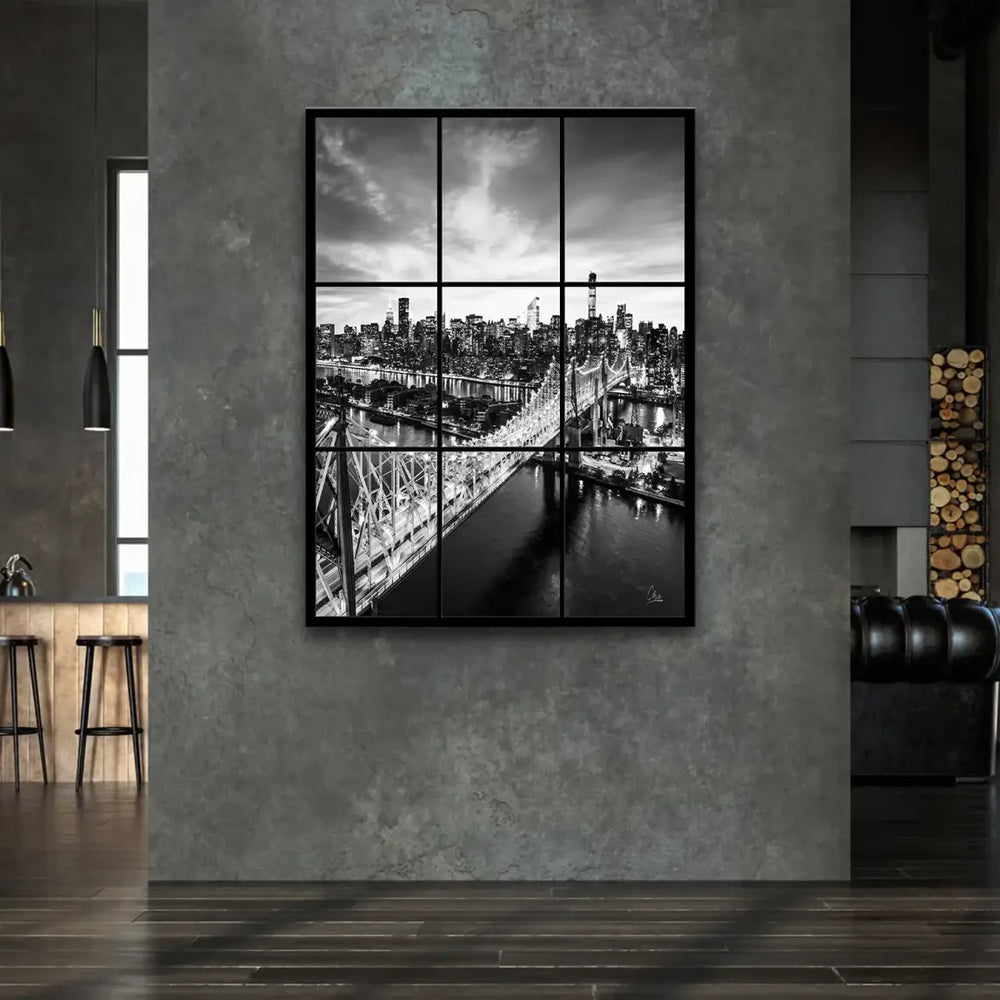 Monochrome urban landscape wall art showing illuminated bridge reflections on water and skyline lights.