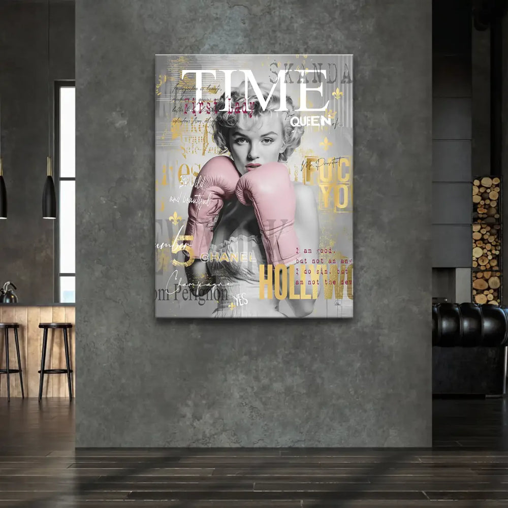 Black and white Marilyn Monroe portrait reimagined in pop art with pink gloves and bold typography