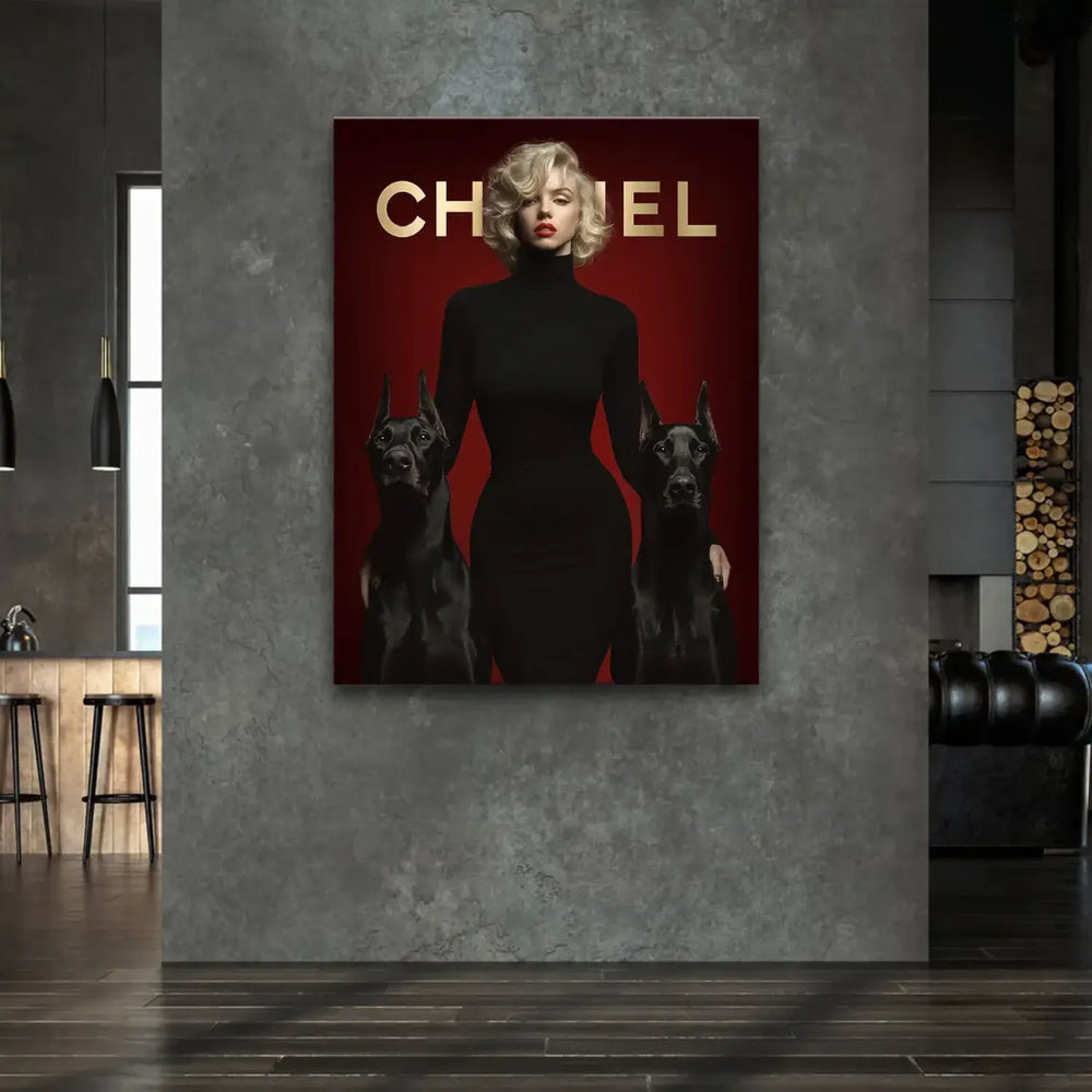 Close-up of the gold Chanel logo on a deep red pop art canvas