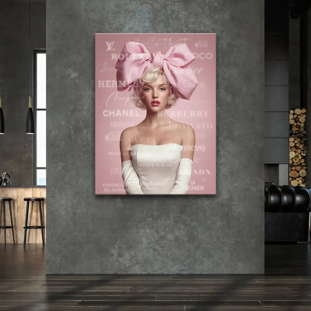 Pink background with hints of Chanel and Gucci branding creating a luxe fashion mood on canvas wall art.
