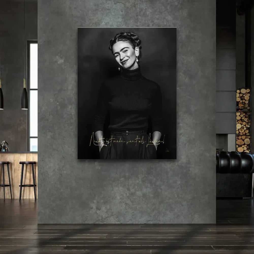 Black-and-white Frida Kahlo canvas with gold quote