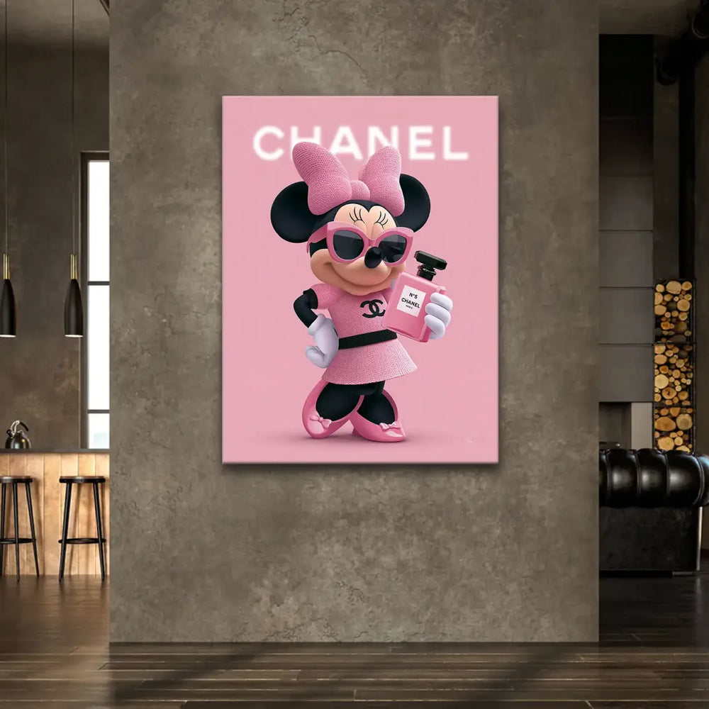 Soft rose pink background with blurred Chanel logo