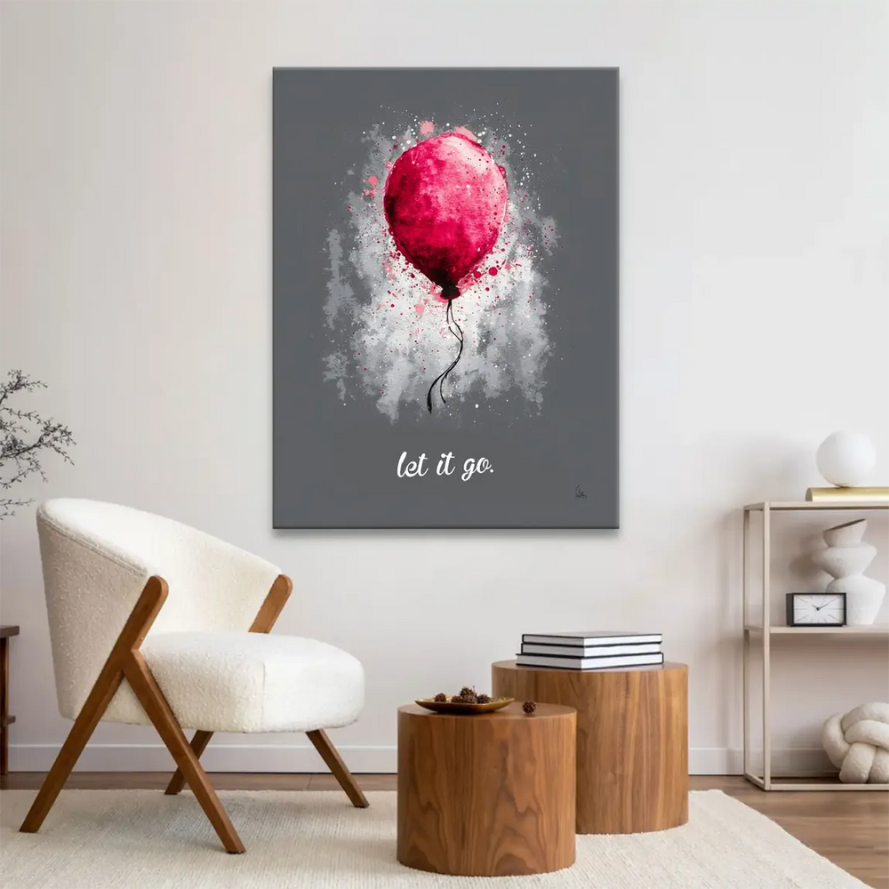 Black string trailing from the balloon with white and pink splatters suggesting motion in an urban abstract style.