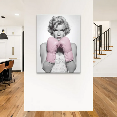 Celebrity portrait canvas wall art of Marilyn Monroe in a boxing pose.
