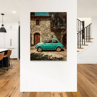 Close-up of the teal Fiat 500 door with weathered stone facade and wooden door in a Tuscan village