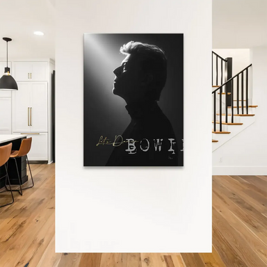 Grayscale portrait of David Bowie on canvas with distressed white 'Bowie' lettering