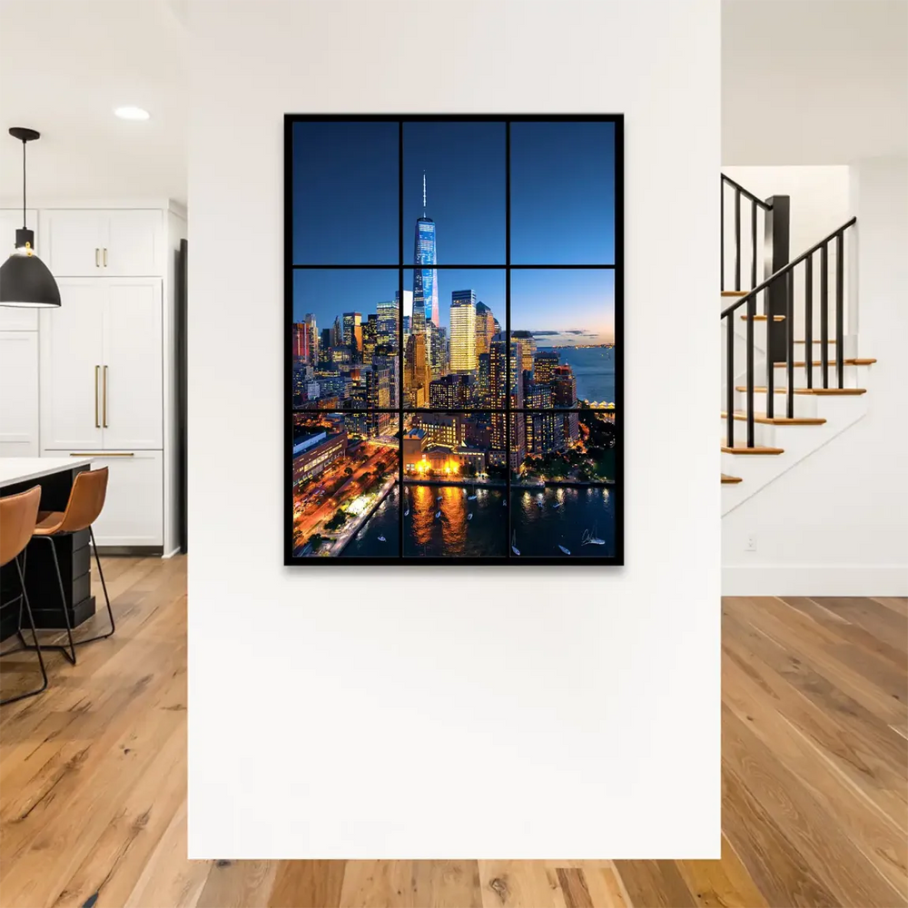 Panoramic canvas print showing the Manhattan skyline at twilight with water reflections and glowing city lights.