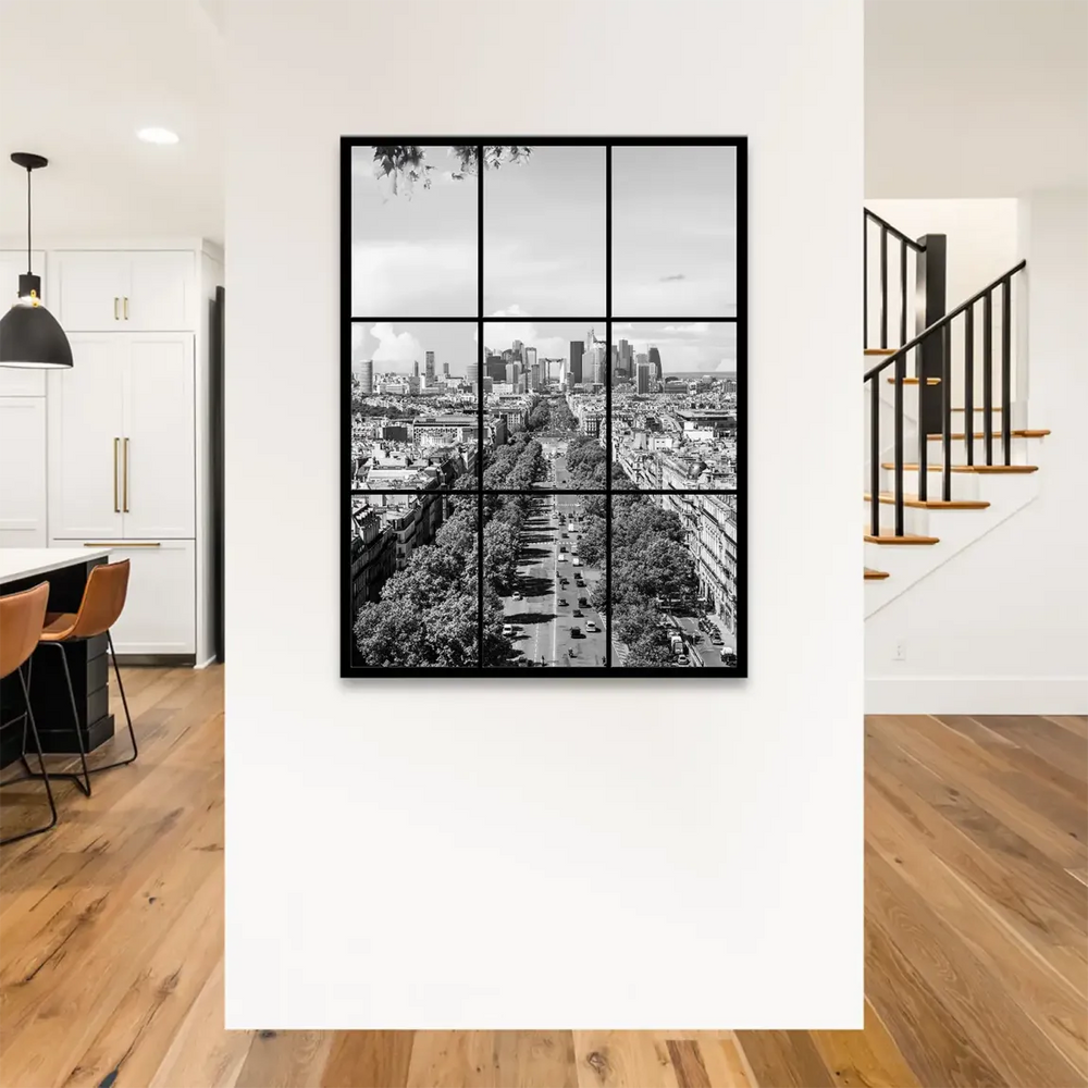 Classic Parisian buildings beside modern glass skyscrapers in a monochrome urban landscape.