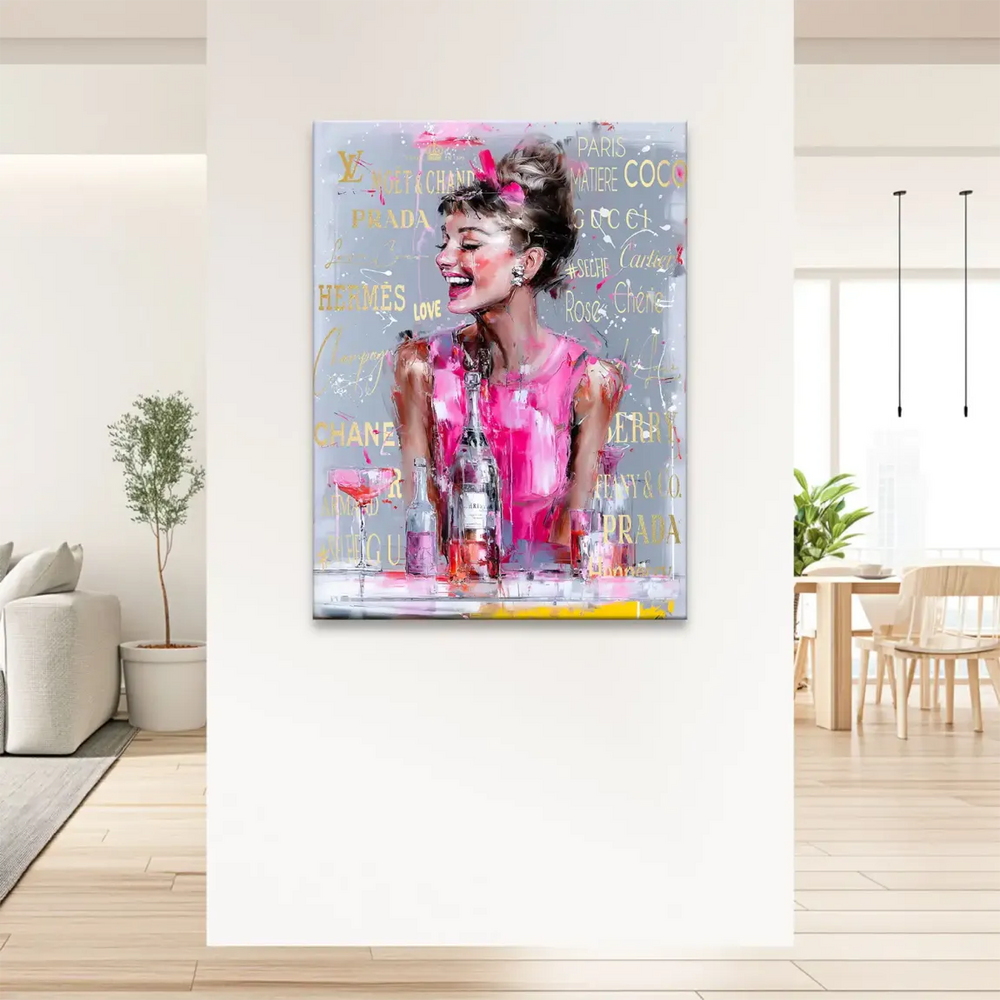 Close-up of bold pink tones and brushstroke texture in a celebrity pop art canvas.