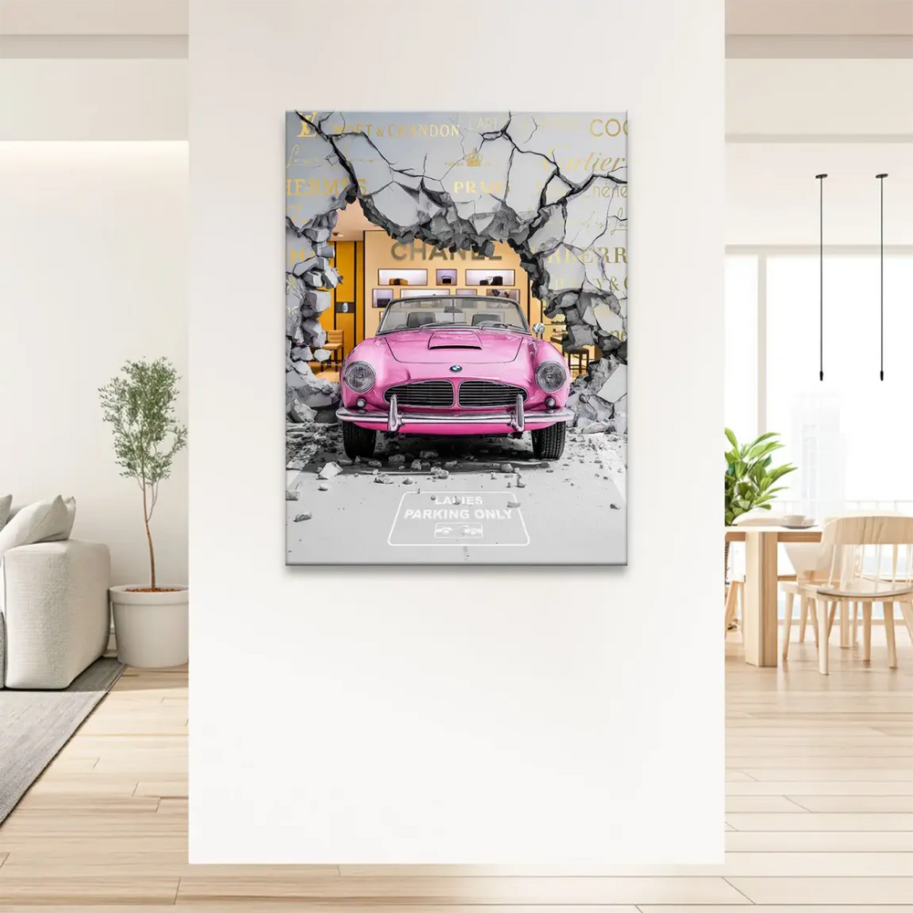 Foreground includes a LADIES PARKING ONLY sign amid vibrant fashion art