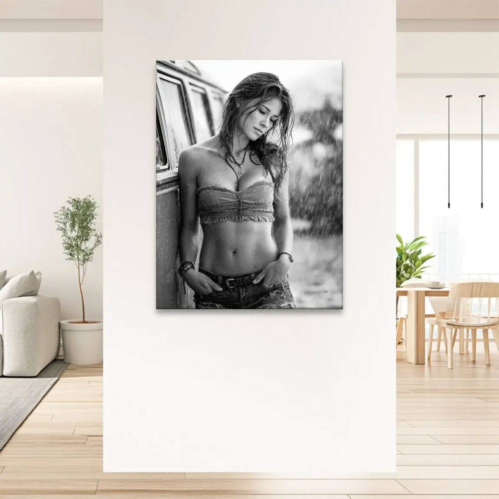 Monochrome photography wall art of a woman by a classic van