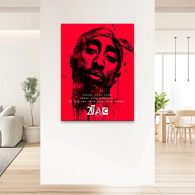 Red background with black portrait and paint splatters canvas art