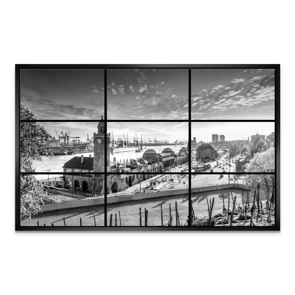 Wide panorama of Hamburg's skyline with industrial elements in grayscale.