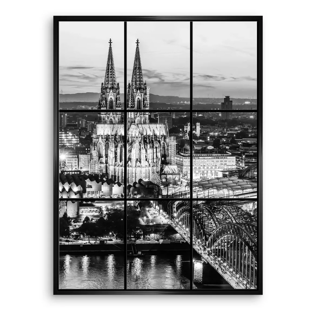 Urban night scene emphasizing symmetry and architectural grandeur along Cologne