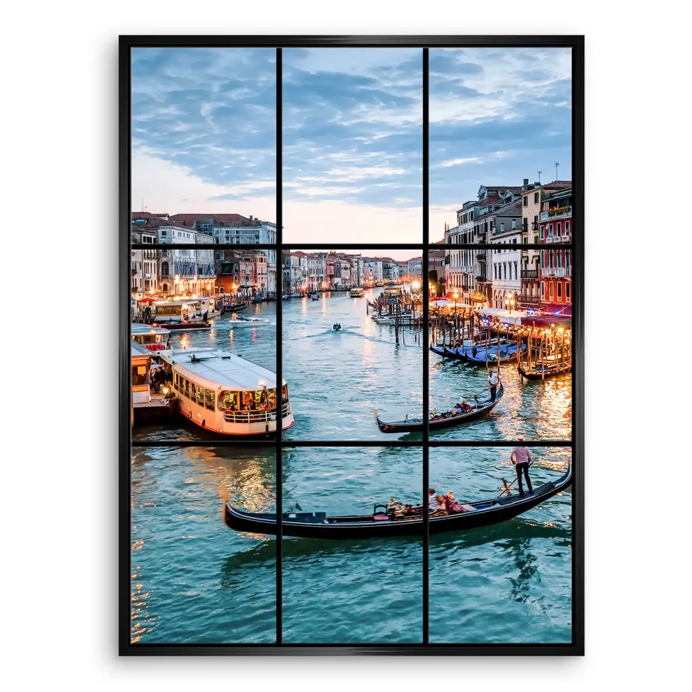 Gondolas moored along the canal beside old facades during twilight in Venice.