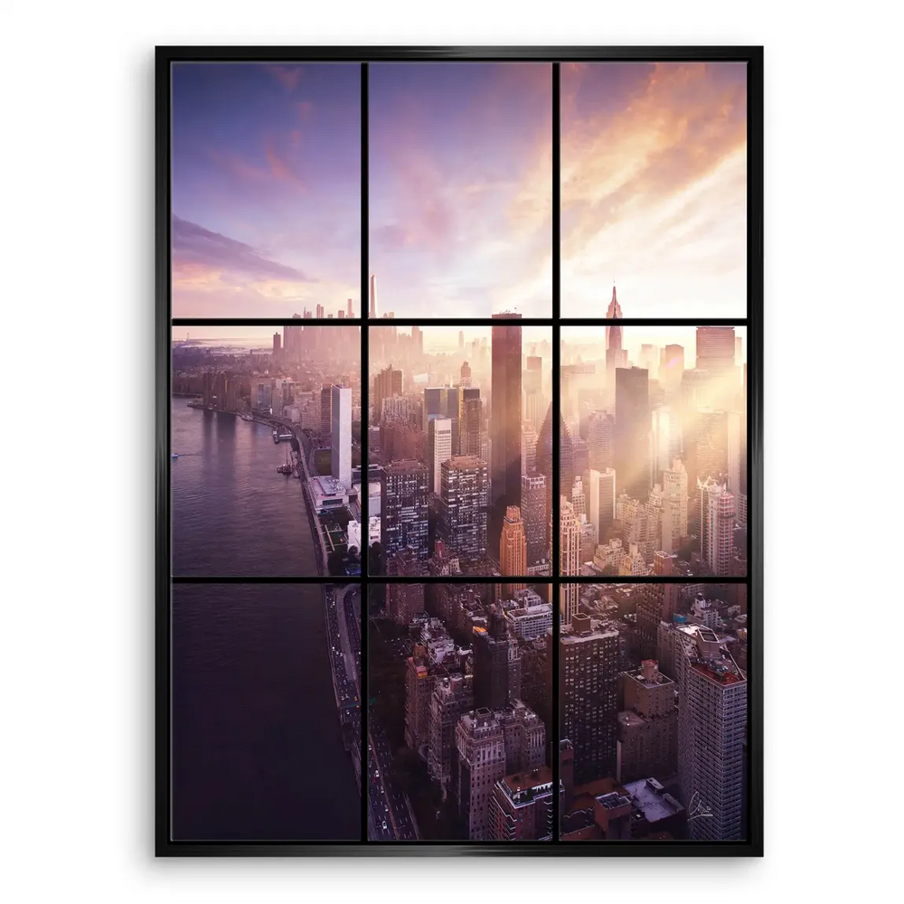 Wide urban panorama highlighting shimmering glass façades and bright morning light.