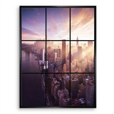 Wide urban panorama highlighting shimmering glass façades and bright morning light.