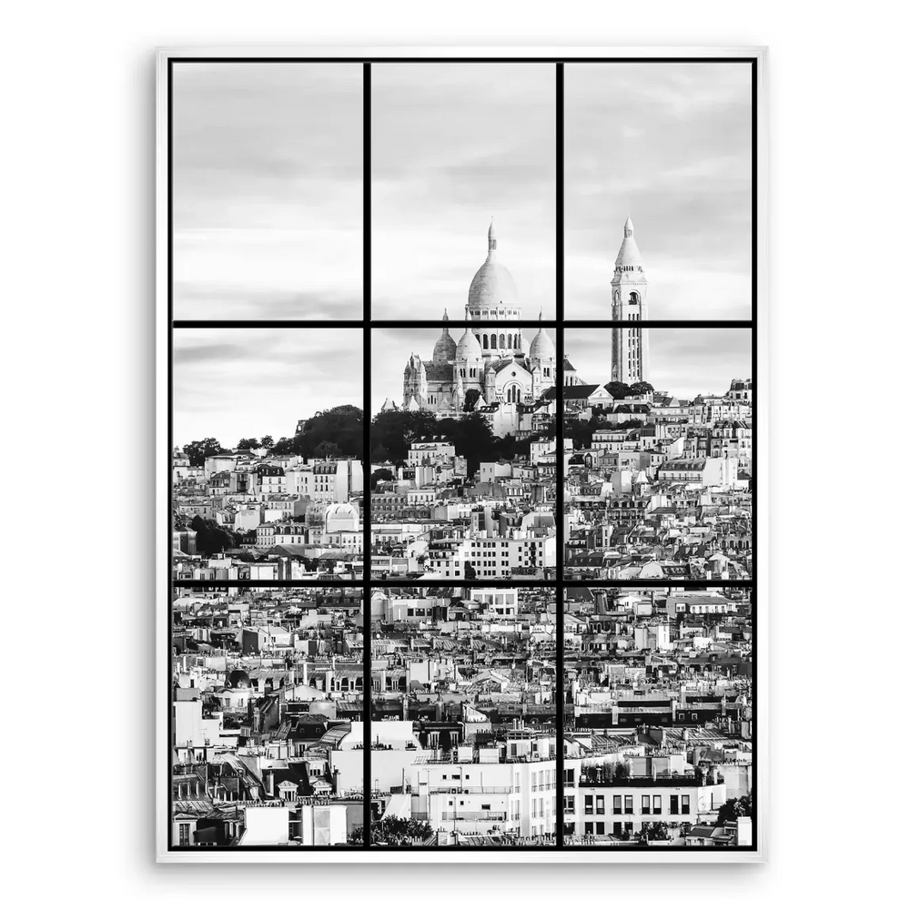 Panoramic Paris view from Montmartre with historic buildings in grayscale.